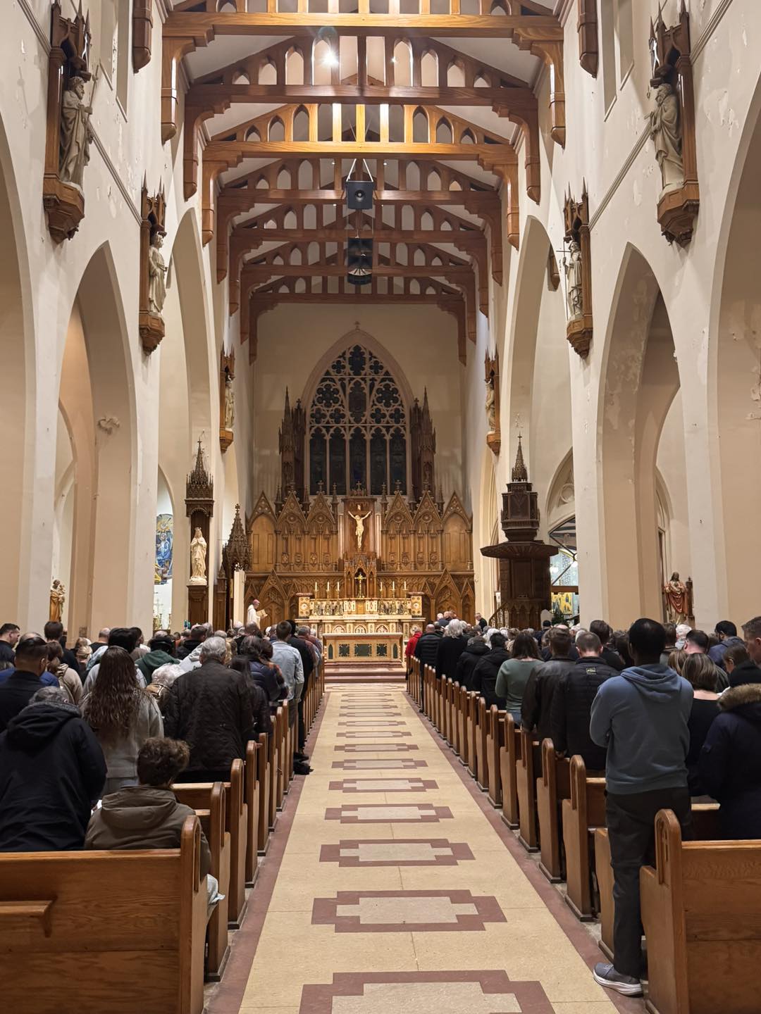 Members of St. John the Baptist Parish gathered in community